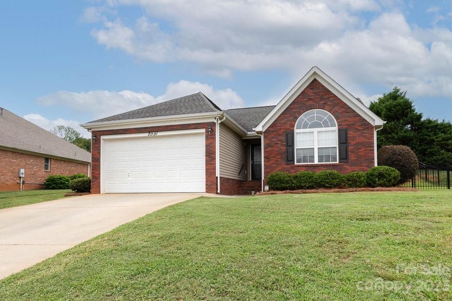 Welcome to Creekside! This perfect ranch is bursting with modern upgrades and move-in ready!!! Step inside and be greeted by the inviting open floor plan. The split bedroom plan ensures privacy and convenience, making it an ideal layout for families and guests. The entire home has been meticulously updated, with all new light fixtures adding a touch of elegance to every room and fresh paint throughout. Privacy shades have been installed, offering both comfort and seclusion for the utmost relaxation. The great room takes center stage with its stunning cathedral ceiling, filling the space with an abundance of natural light and a sense of grandeur. The focal point of the room is the tile fireplace. The kitchen has a custom tile backsplash, granite countertops, and stainless appliances! The patio provides a perfect spot for outdoor gatherings and entertainment, while the fenced yard ensures security for all your loved ones. Come on home!