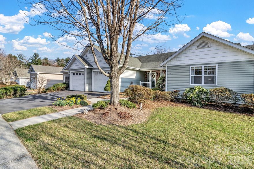 Located just minutes from the charm of Flat Rock and vibrant Hendersonville. This well-appointed townhome offers the perfect blend of comfort, convenience, and modern living. Enjoy easy access to the renowned Flat Rock Playhouse along with a variety of local dining, boutique shopping, and everyday conveniences.
Inside, the home features a modern kitchen with crisp white cabinetry, gas appliances, and a functional layout ideal for both everyday living and entertaining. Large primary bedroom offer wooden blinds that encase large double windows.  Thoughtful upgrades throughout the home add comfort and efficiency, including a 24-hour Generac whole-home generator to keep everything running smoothly.
The attached garage is designed with both practicality and hobby space in mind, featuring a dedicated EV charging station, built-in workbench, shelving, and additional storage. Convenient attic access from the garage provides even more storage options.  With its desirable location near arts, dining, and shopping, combined with modern features and reliable backup power, this townhome is an excellent opportunity to enjoy low-maintenance living in one of WNC’s most sought-after areas. This is a fabulous community that features chili cook-off, supper club, dog parade, holiday festivities and more.