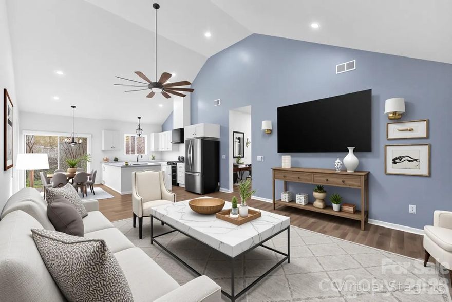 From the moment you pull up, this stunning new-construction ranch feels different. A charming front porch sets the tone, inviting you to slow down and step inside. Once through the door, the home opens up into a bright, airy living space where vaulted ceilings, wide-plank LVP flooring, and abundant natural light create an effortless sense of comfort and style. The heart of the home is the show-stopping kitchen, designed for real life and real gatherings. A large island anchors the space, offering plenty of seating for weeknight dinners, weekend entertaining, or casual conversations. Soft-close cabinetry, granite countertops, a farmhouse sink, custom tile backsplash, and a statement vent hood come together in a way that feels both timeless and modern.
Mornings start easily here—coffee at the dining table or stepping through the sliding glass doors to the patio as sunlight pours in. Evenings wind down in the private primary suite, complete with a tray ceiling, accent wall, ceiling fan, and two closets, including a spacious walk-in. The en-suite bath feels like a retreat, featuring dual vanities with granite counters and a beautifully finished oversized glass-and-tile shower with rainhead faucet.
Every detail in this home was thoughtfully selected, offering custom touches and quality craftsmanship rarely found at this price point. This home is designed to be lived in, loved, and enjoyed, all with the freedom of close access to Shelby and Kings Mountain.