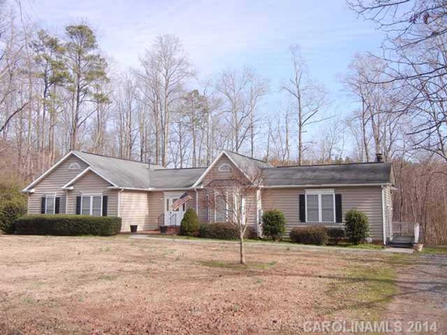 Lovely flow to this 3 bedroom, 2.5 bath modular ranch. Very private on 1.03 ac. Features large den, living room, dining room. Eat-in kitchen.