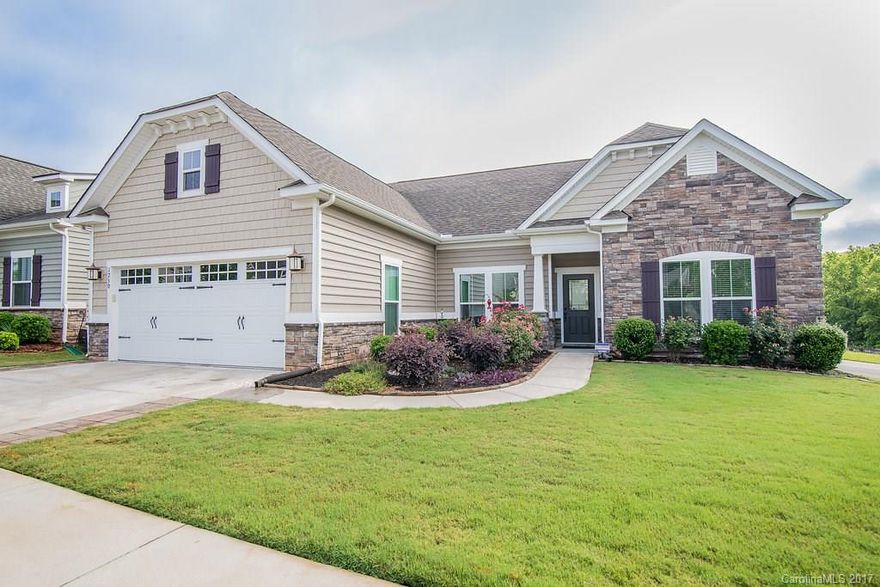 New hardwood flooring on main! Open floorplan with 3 bedrooms on main and upstairs bonus room. Granite in kitchen, breakfast bar, gas range, backsplash, custom cabinetry in laundry, oversized patio with retractable awning, and large corner lot. Close proximity to amenities.