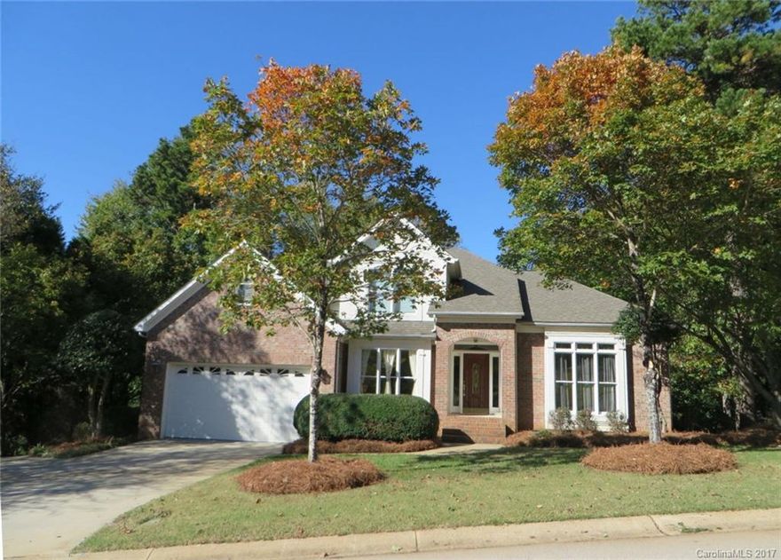 Serenity! Enjoy this peaceful private backyard and spacious full brick home with owners suite on the main level in the prestigious Anchorage section of Tega Cay.  Grand 2 story entry with hardwoods in dining room and kitchen. 2 story great room with lots of light, built ins and fireplace. Chef's Kitchen with Granite counter tops & tile backsplash, SS appl incl. gas stove, work island/breakfast bar. Roof replaced in 2015. HVAC replaced in 2016.  3 BRs + Bonus up. Fresh neutral ready to Move in!