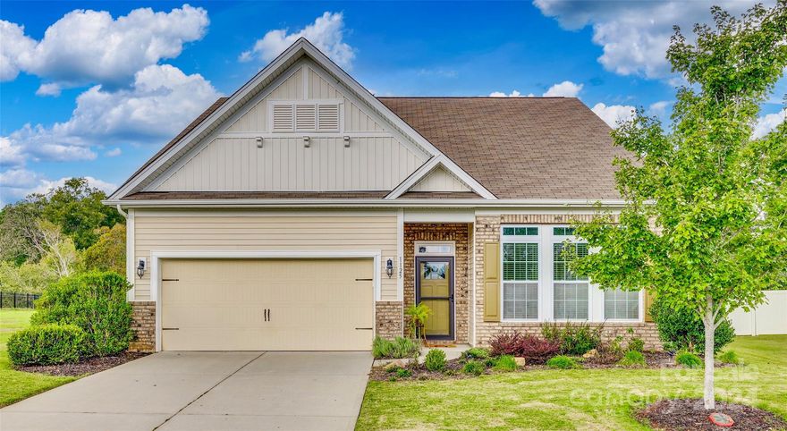 Welcome to 1125 Jack Pine a beautifully maintained home in the highly respected Clover School District! Upon entering, notice the spacious foyer with tray ceiling and thoughtfully open (split) floor plan, highlighted by a large great room and dining area, ideal for entertaining. Enjoy crown moldings, wainscoting in the dining room, and stunning granite countertops in both the kitchen and bathrooms. The kitchen cabinets offer a pop of color, stainless steel appliances, an impressive 14 ft island. Living room is perfect for enjoying nights by the fireplace and is large enough to provide a separate, relaxing sitting area. Natural light flows throughout, creating an inviting atmosphere. The living areas are seamlessly connected, perfect for togetherness. The owners' suite features a tray ceiling, ensuite with dual sinks, extra-large shower, and generous walk-in closet. Step outside to the private yard, backs up to woods and adjacent community green space. Schedule your showing today!