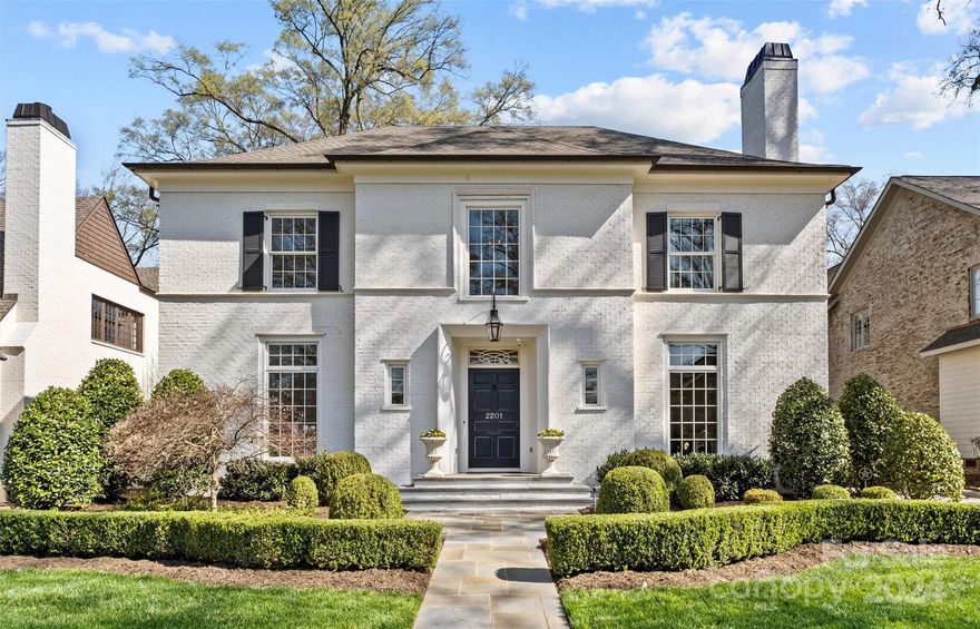 LUXURY LIVING IN MYERS PARK! This spectacular custom home, designed by Greg Perry Design & built by Knight Residential Group, exudes luxury & sophistication. Desirable floorplan for effortless entertaining & everyday living. Unique, custom & high-end finishes throughout. Spacious living rm w/fireplace & beautiful dining rm. Show-stopping chef’s kitchen open to a fireside family rm, wet bar w/svc opening to foyer, & large sunny breakfast rm. Side entry w/drop zone & built-ins. Primary suite on upper w/ensuite bath featuring double vanity, shower, soaking tub & walk-in closet. 3 addt'l bedrooms w/ensuite baths & large laundry rm on the upper. Bonus rm, 5th bedroom & full bath on the 3rd level. Guest suite/bonus rm w/a full bath over the detached 2-car garage. Extend entertaining outdoors on the screened porch w/fireplace & covered porch w/built-in grill, overlooking the private backyard w/gorgeous landscaping. This stately home is convenient to shops & restaurants in the Myers Park area.