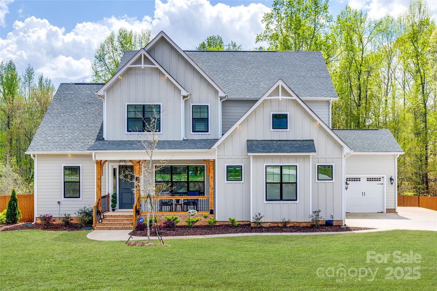 Back on the market due to buyer contingency falling through. Timeless charm meets refined luxury. Built in 2023 & situated on a 1+acre lot, this 4,159 sq ft home offers a thoughtfully crafted open floorplan with soaring 10' ceilings on the main level & 9' ceilings upstairs. A see-through fireplace connects the living room & sunroom, creating a cozy space. The chef’s kitchen is a true showstopper—featuring a massive quartzite island, dual wall ovens, a gas cooktop & 2 pantries. The main-level primary suite offers a spa-like retreat with a luxurious bath & an oversized walk-in closet with secondary laundry hookups. Upstairs, a massive laundry room with a sink. Extra features inc. a spacious loft, office, formal dining room, screened-in back porch, fenced backyard w/ corner chicken pen, & a 3-car attached garage. Thoughtful upgrades such as a tankless water heater, encapsulated crawl space & prem. finishes throughout round out this one-of-a-kind home. Currently, taxed at non-primary rate.