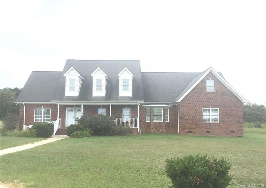 If you're looking for 'country', this one is just for you! Own 8 acres & a home with over 4000 sq feet! Located in 100 percent financing eligible area!! Home was formerly a bed & breakfast - so you can live like you're on vacation everyday. Tons of privacy and endless opportunity for entertaining. Features include formal dining, fireplace, back balcony, porch, deck, built-in shelving, rec room, bonus room & great room! Grand master bedroom! Tons of land! Don't miss out! Schedule a showing today!