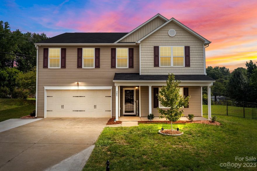 OVER 3,200 SQ FEET OF LIVING AREA!!! The 4 bedrooms and 2.5 bathrooms, along with the convenient cul-de-sac location, contribute to its appeal. The covered front porch creates an inviting entrance, and the open floor plan of the family room is well-suited for entertaining guests. The kitchen features a center island, wood floors, and ample cabinet space. The primary bedroom, separate from the other bedrooms, offers a vaulted ceiling, a spacious closet, and a bathroom with a soaking tub, separate shower, and double vanities. The downstairs bedroom provides versatility and can be used as a home office, bedroom, dining area, playroom, or media room. The private backyard includes a patio, mature trees, and a fully fenced lawn for your enjoyment.