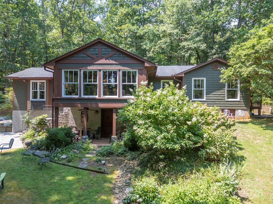 Discover your dream home in the heart of Tryon! This charming 3-bedroom, 3 bath  residence spanning just over 2,000sf, blends classic style with modern functionality. Thoughtfully designed with permitted additions, this home offers spacious living areas, perfect for families or those seeking a serene retreat. Nestled in a private, picturesque setting, this quintessential Tryon home boast a warm, inviting atmosphere with ample natural light and versatile spaces. Enjoy the convenience of being just minutes from downtown Tryon's vibrant shops, restaurants, and cultural attractions, while maintaining easy access to I-26 and I-85 for seamless commuting.