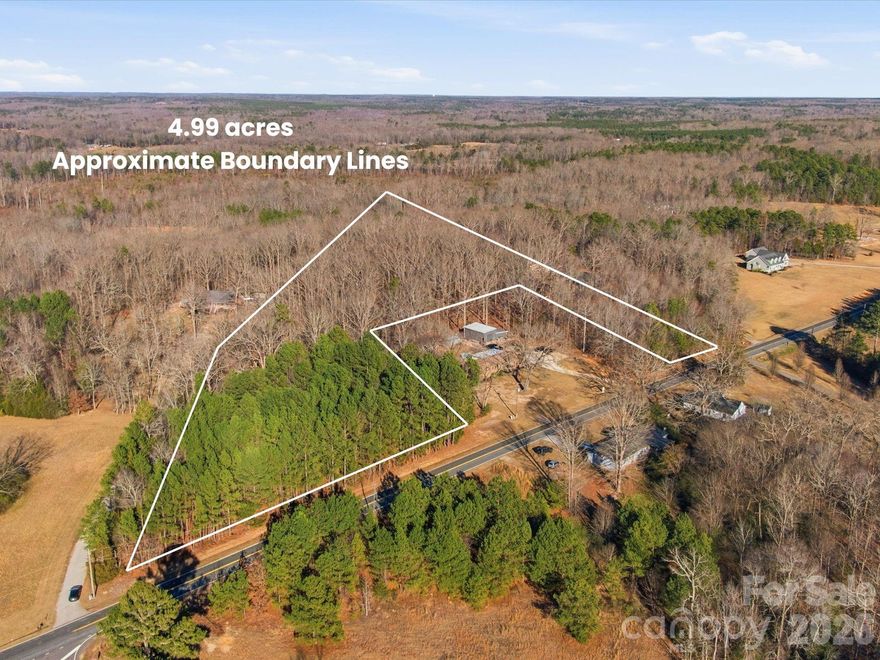 The perfect canvas for a private estate on this exceptional 4.99-acre wooded homesite located in the highly regarded Buford School District. Offering two potential driveway options, you can tuck your dream home behind the trees. Property provides flexibility for multigenerational living, a weekend retreat, or a small farm. 
The setting offers the ideal balance of peaceful rural living while remaining convenient to nearby Waxhaw, Indian Land, Lancaster, and Monroe, with easy access to shopping like Costco, Target, Homegoods, restaurants & more! There have been two "possible" home sites identified and they perc for 5 bedrooms. DHEC approval & plat map available upon request.