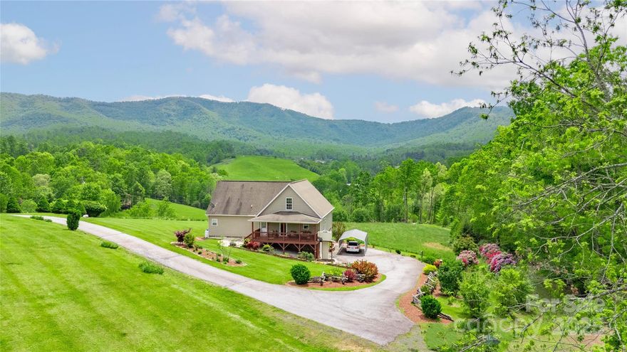 Built in 2006 and surrounded by the awe-inspiring beauty of the Blue Ridge Mountains, this one and a half story home offers panoramic mountain views, a sprawling open yard, and the kind of peace only found in nature. The wraparound driveway provides easy access and ample parking—perfect for RVs, campers, or trailers. Inside, the main level features a spacious living room with a cozy gas fireplace, a well-appointed kitchen, and a main-level primary bedroom for convenience. Upstairs you'll find two additional bedrooms and a full bath, ideal for family or guests. A full unfinished basement with durable concrete floors offers endless potential—a workshop, home gym, or extra storage. Whether you're seeking a full-time residence, a mountain getaway, or a vacation rental opportunity, this property combines comfort, versatility, and incredible views in a location that feels like a true retreat.
