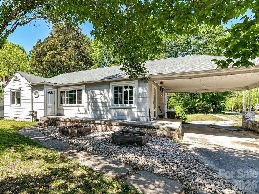 Located in the Historic East Chester neighborhood, this character-filled home is ready for its next chapter. Offering a unique opportunity for investors or buyers looking to restore and personalize, this property is being sold as-is.
Inside, you’ll find charming knotty pine walls throughout the living, dining, and kitchen areas, adding warmth and vintage appeal. A wood-burning fireplace serves as a focal point in the living space (condition unknown). The home also features newer windows, providing a solid starting point for future improvements.
Situated on a large, flat lot, the property includes a storage shed, carport, and a convenient circular drive-through driveway for easy access and ample parking.
Positioned along a main road, the home offers convenient access while being surrounded by the charm and character of neighboring historic properties. Located just minutes from downtown Chester, you’ll enjoy proximity to local shops, dining, and amenities.
With its classic character and desirable surroundings, this home presents a great opportunity to bring your vision to life.