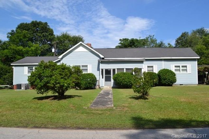 Unique ranch home w/ enclosed front porch in quiet neighborhood of Great Falls well kept secret! Two spacious living rooms, cozy kitchen w/ tons of counterspace, breakfast area and rustic look cabinetry! Well groomed yard, covered patio made for the perfect cookouts!  Storage area in detached garage. *2nd living quarters with den, and bonus room that could be an office or play room.  Extra full kitchen! Newer water heater was replaced in 2016.