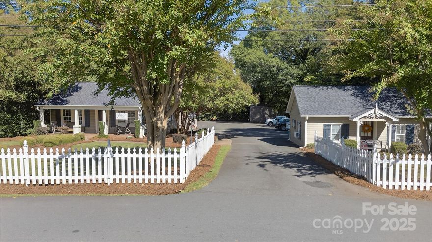 Prime investment opportunity in the heart of Cornelius, NC! Located close to vibrant Downtown with great visibility along Statesville Hwy. and perfect for your Business or next Venture! Two units totaling 2,119 Sq Ft perfectly suited for professional Offices, Medi-Spa, Retail and Neighborhood Center Services. The Main house could be a private residence with detached studio or home-based business. Great bones with nods to historical charm with modern updates--wood floors, fireplace, updated Kitchen & Baths--and large deck. There is secure storage and a carport. Additional Flex space that could be used as more storage or upfit for an additional use. X-Large, 2-bay detached Garage with high ceilings that could accommodate car lift AND covered Boat/RV Parking! Large asphalt parking with 20+ spaces. So much potential here and More!! Endless possibilities in this vibrant & growing region!