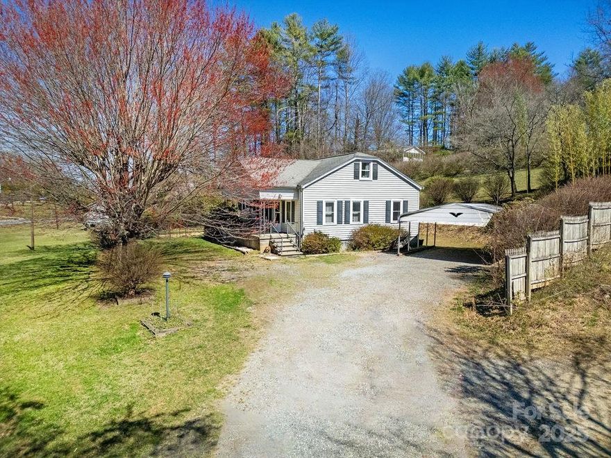 Welcome to 21 Byrd Lane. This charming home sits on 2.10 acres just minutes from downtown Brevard, Pisgah National Forest, and DuPont State Forest. It is conveniently located for shopping and nightlife. There is endless potential with this unrestricted highway frontage property just outside the city limits. It gives you potential to have a commercial property, homestead or both. The shop offers an easy turn around area and extra space for additional parking. The spacious yard offers enough room for gardening, a fire pit and it already has a fenced yard for your pets. The detached shop has an electric panel for a workshop or future studio. The extra storage building on the property was the old Monteith’s Grocery store. So much to see at this property. Make an appointment today.