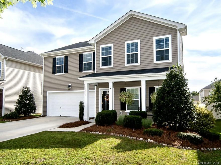 Beautiful, impeccably maintained former Ryland model home! Wood floors on much of main level, custom paint, kitchen features granite countertops, stainless appliances and island.  Four bedrooms up with open loft, master with separate garden tub and shower. Refrigerator, Washer and Dryer included!  Fenced yard with expanded stamped concrete patio.  Convenient to shopping and schools...Don't miss out!