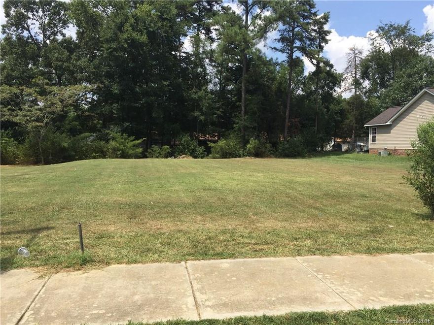 Level and cleared building lot on existing street of starter homes in the City of Monroe.  Existing homes constructed around 2004.  Three lots, #17 and # 23 (next door) also for sale at $15,000.  The City of Monroe has some restrictions concerning type and size of home to be placed.  Water and Sewer at street.