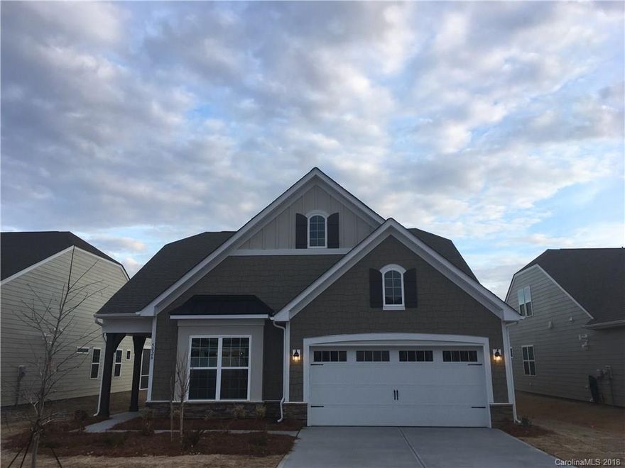 Features galore in this beautiful home!  2 Spacious bedrooms, Generous great room,  Rear Porch is screened! Beautiful interior features like stainless steel appliances, gas range, and quartz kitchen counter tops with ample work space!  Master has details you want :large tiled shower with seat, separate water closet and linen closet!   Separate Mudroom and Laundry Room and extra storage in the garage too!  The perfect home!