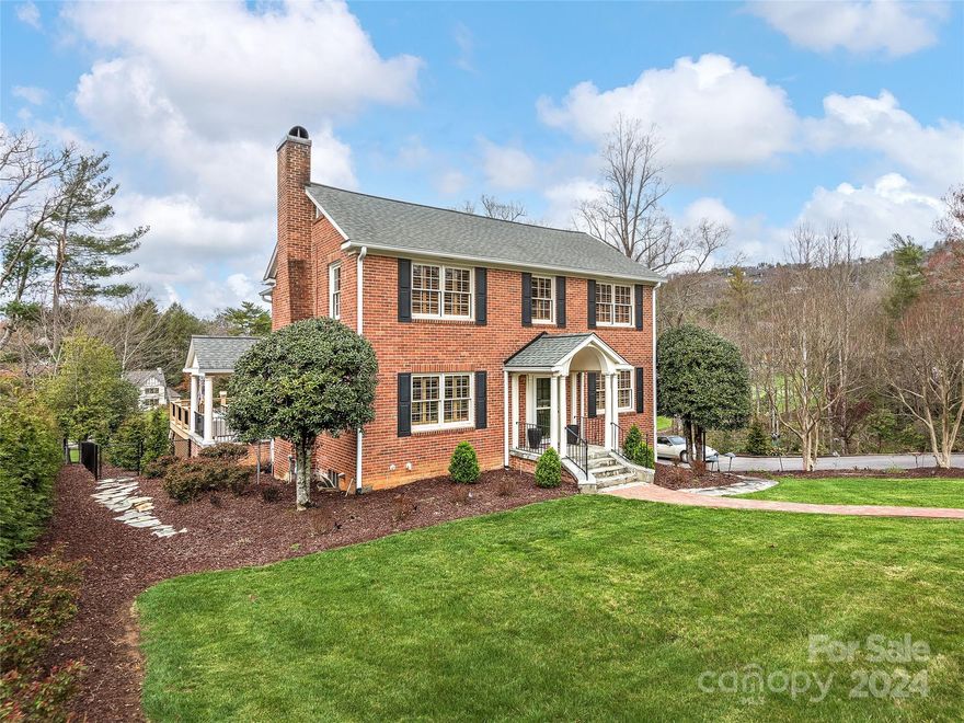 Pre-inspected classic brick colonial located on the 2nd fairway of the Asheville Country Club! A perfect blend of timeless appeal and historic charm on the outside with elegant updates on the inside. The main level features oak hardwoods, a cedar coat closet, a fully renovated kitchen with walk-in pantry, breakfast nook, elegant dining room, and study off of the large living room with gas logs fireplace and carrera marble surround. Upstairs the oak hardwoods continue and you will find the primary bedroom with a large walk-in closet and fully renovated ensuite. Two guest bedrooms each with their own cedar closet and a jack and Jill bath complete the upper level. The basement features a family room with built-in bar, kitchenette, full bath, unfinished storage room and sauna. Above the garage, there is an additional office or rec room. Enjoy the ample outdoor space that includes a large deck, stone patio and fully fenced yard opening onto the golf course and path to Beaver Lake.