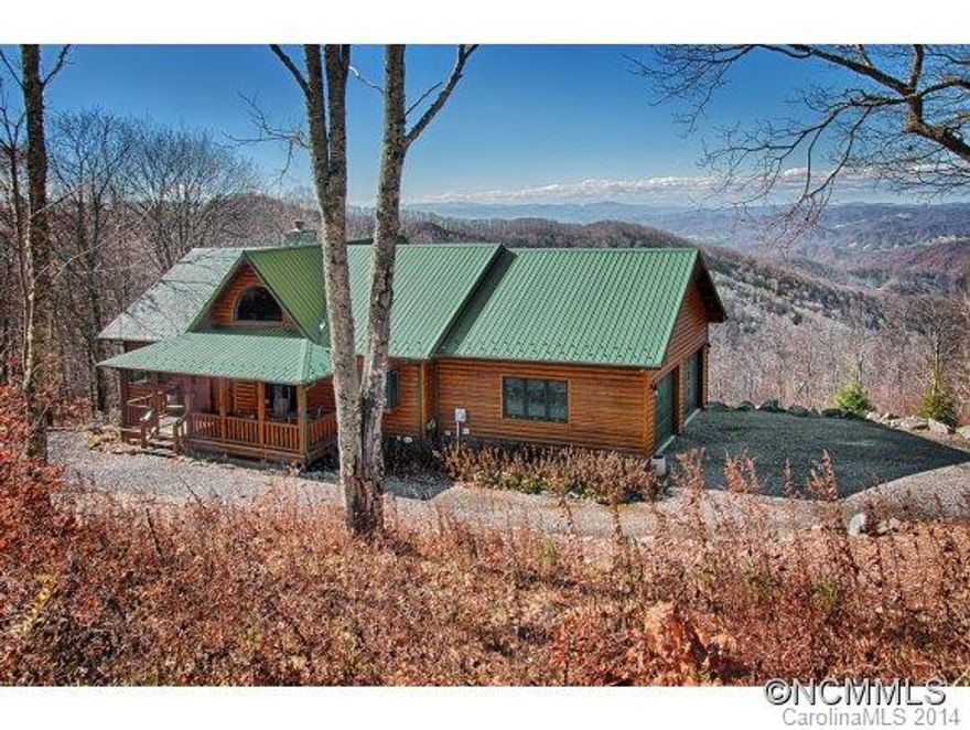 For the adventurous spirit looking for a piece of Heaven.  Literally perched on the highest mountain sitting in the clouds with the most magnificent views this broker has seen in 25 years of living in Western North Carolina!!  This impeccably well built "Tahoe Style" Log Home is looking for a new owner. Enjoy the best in life in this romantic getaway located a comfortable drive of 40 minutes from Asheville or 30 minutes Burnsville.
