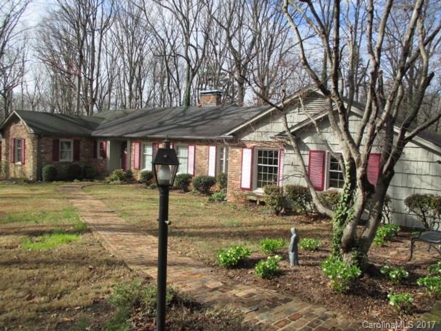 Beautiful 3BR/2BA home on .86 acres. Home has formal living room w/fireplace & formal dining room. Breakfast area with lots of lighting next to kitchen. Den is a large room w/fireplace and built-in.  Go through glass sliding doors from den and step into a beautiful sunroom. This home will not disappoint.