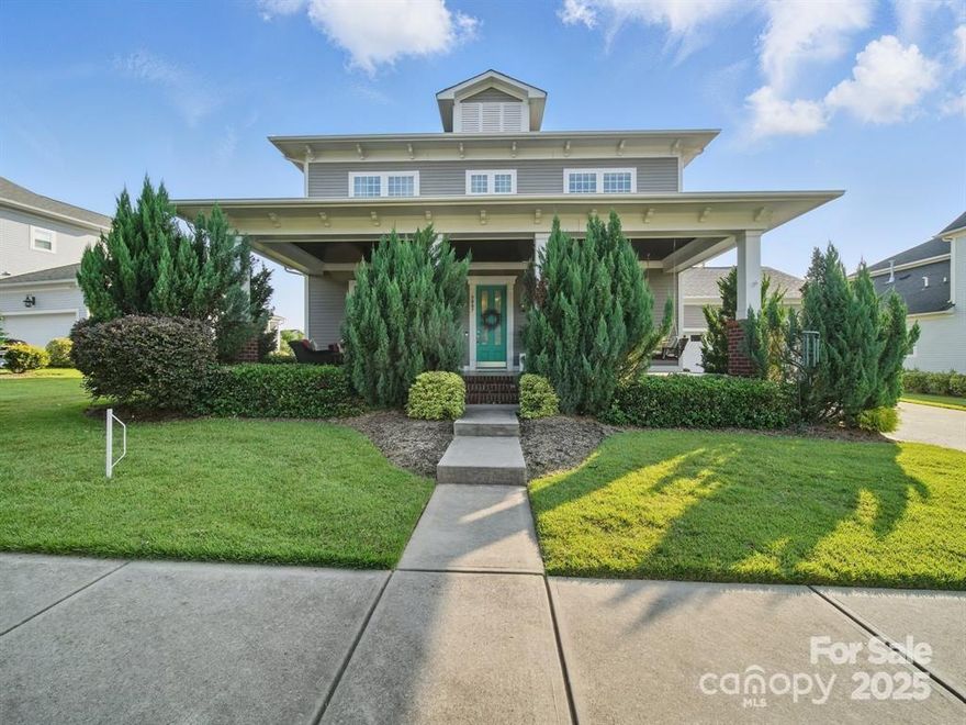 Step into this stunning 5-bedroom, 3.5-bath retreat, where comfort meets elegance. A spacious covered front porch welcomes you, setting the tone for the warmth and charm inside. The primary suite on the main floor offers a private sanctuary with dual vanities, a relaxing garden tub, and a separate tile shower. Designed for entertaining, the open-concept kitchen and living room seamlessly flow together, featuring a luxury kitchen with a 5-burner gas cooktop, double wall ovens, and a central island—perfect for gathering with friends and family. Upstairs, the additional bedrooms provide ample space, including a private guest suite with its own large full bath. Step outside to enjoy the screened-in back porch, overlooking a generous open lot—ideal for outdoor activities. Nestled within a vibrant community, you’ll have access to top-tier amenities. This home is the perfect balance of style, function, and luxury—don’t miss the chance to make it yours!