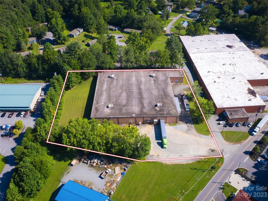 Do not miss out on this highly flexible 41,600sf warehouse/manufacturing facility.  With an open interior, the space features 25'x33' column spacing, 20' ceiling height, three dock doors, two roll up drive-in doors, and room to expand the structure if needed.  The building is sprinkled and has 3 phase 208v power, natural gas, sewer and water.  The building sits on 2.44 acres directly across the street from Depot Park and the Estatoe Trail.  The current tenant plans on vacating in the coming months so the building would be delivered vacant. For a user creating jobs there may be a variety of local and state grants available for building reuse, development, Duke Energy rider, and employee training.  The property is conveniently located in the highly desirable community of Brevard and less than 1 mile from the bustling downtown. This property did not receive any notable damage from Helene and is available immediately.