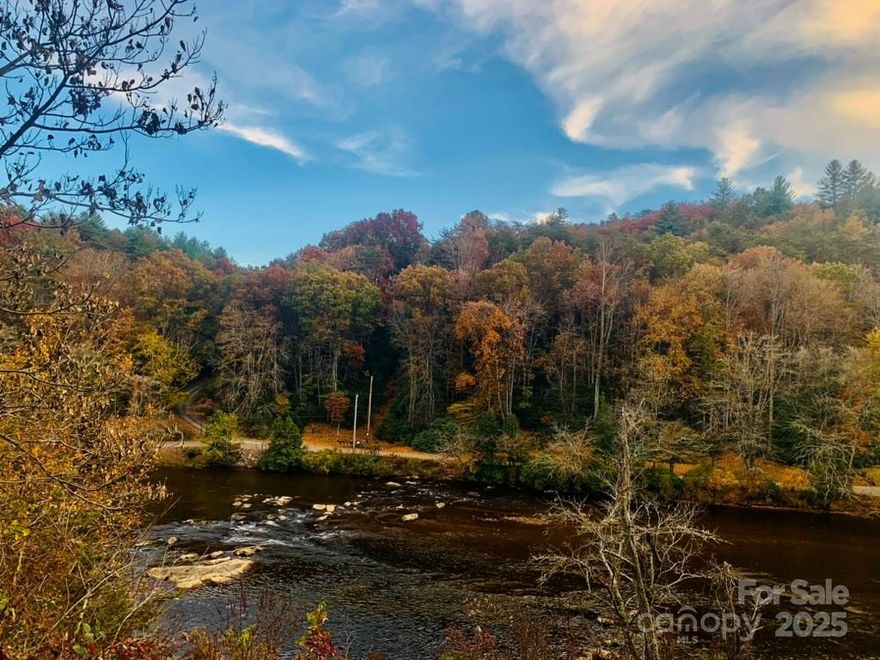 Lot 2 Osprey Mountain Way features a ridge top homesite; river frontage and river views; a current 3-br septic permit; well permit, or buyer can access Lot 1 well with an agreement with Seller. Utilities; partially cleared home site and entry. Abundance of hardwood trees and the house site opens to incredible river and long-range Southeastern views. Ideal for a walk-out basement and/or multi-story home. Take a short stroll down to your own private river access. Conveniently located within 4 miles of Sylva, Dillsboro, and Cullowhee, and is unrivaled in its proximity to local amenities and mountain top seclusion, views and Tuckasegee River frontage which makes this property truly unique for the area. Franklin, NC (15 miles). Asheville, NC (35 miles). National & State Parks, Blue Ridge Parkway, Hiking, Rafting, Tubing, Trout Fishing, Casino, and Nightlife.