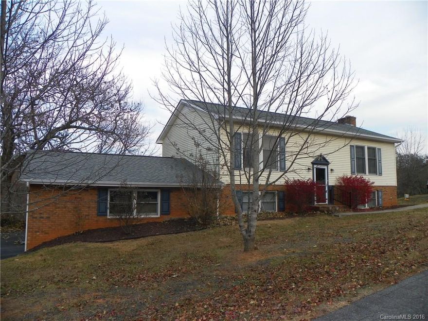 Want to live in desirable Weaverville? Spacious turn-key, 3 bed, 2 bath, split-level home with a view of Mount Mitchell from back deck. Recently converted master bedroom. Close to downtown Weaverville and only 12 minutes to downtown Asheville. Fenced in back yard, two car garage, charming home w/loads of storage.