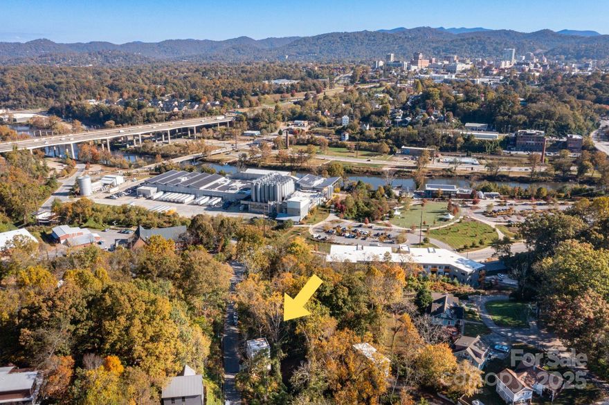 Amazing West Asheville building lot near the River Arts District and downtown. This location offers premier accessibility to everything that is Asheville, NC. Enjoy easy access to local restaurants, breweries, shops, parks, greenways and art studios that define the area’s unique character. The sound of the nearby creek adds a peaceful touch to the setting. The home next door is also available and offers a clear example of what could be built on this lot. A rare chance to create a home in one of Asheville’s most active and growing areas.