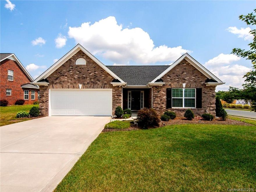 Fabulous all brick one story home on beautifully landscaped corner lot. Hardwoods in foyer,great room,breakfast,hallways and sunroom. Kitchen with upgraded stainless appliances, granite counters,ceramic tile floors.  Great room has full masonry fireplace w/gas logs,open to bright sunroom. Master suite with walk-in closet, dual vanities w/granite counters, 5 ft shower and ceramic tile floor. Awesome 12 x 15 patio with stamped concrete and raised wall. A must see