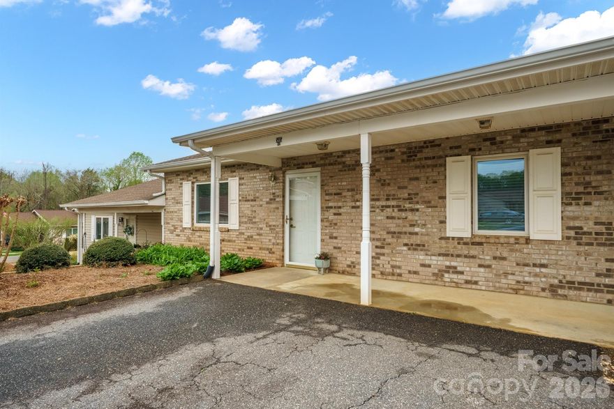 Wonderful townhome in the heart of Conover. This 2 bed/1 bath has just been freshly painted and new flooring throughout, except the bathroom. LVP flooring was installed in the living area and hallway. New carpet in the bedrooms. This open and airy floor plan makes it easy to navigate with a wheelchair or walker. 36 inch doors and bathroom grab bars. The primary suite hosts a WIC and direct access to the bathroom.The rocking chair front porch to visit with friends, or the private covered back porch on the days you just want to relax. The unit also has a storage room equipped with a water heater. The is a level drive and this property has NO STEP entry. HOA fees are $140 per month.