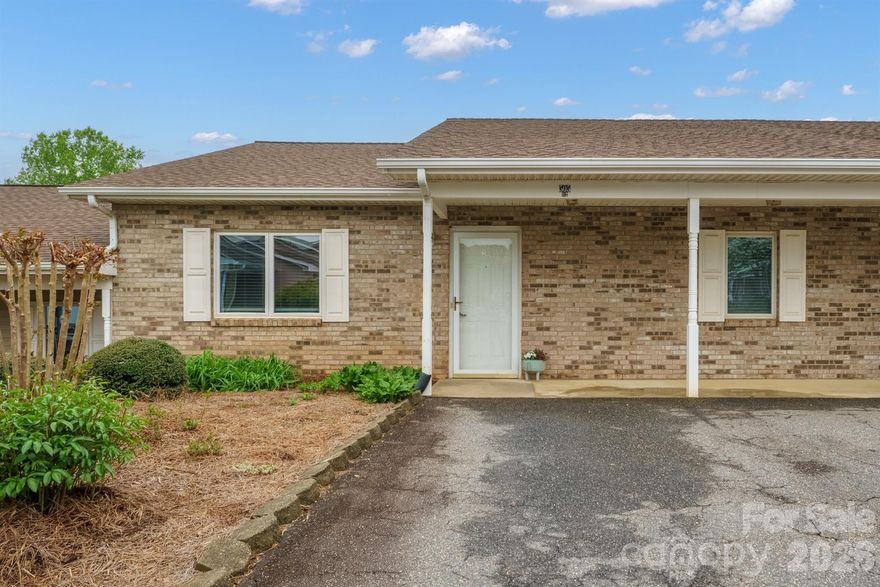 Townhome in the heart of Conover. This 2 bed/1 bath has just been freshly painted and new flooring throughout, except the bathroom. LVP flooring was installed in the living area and hallway. New carpet in the bedrooms. This open and airy floor plan makes it easy to navigate with a wheelchair or walker. 36 inch doors and bathroom grab bars. The primary suite hosts a WIC and direct access to the bathroom.The rocking chair front porch to visit with friends, or the private covered back porch on the days you just want to relax. The unit also has a storage room equipped with a water heater. The is a level drive and this property has NO STEP entry. Brand new disposal.HOA fees are $145 per month. Roof 2018 per HOA records. Roofs are not covered by HOA.