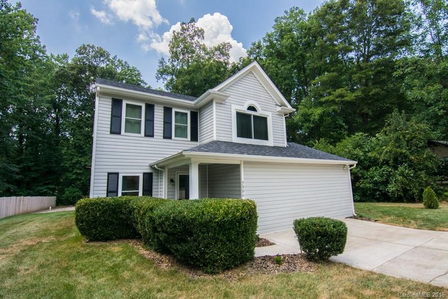 Lovely 3 bedroom 2.5 bath home located minutes from I77, I485, Northlake Mall and other entertainment. This home has been meticulously maintained and is move in ready! Huge great room. Energy efficient windows and fans (2014). Hardwood floors throughout the main level, and beautiful tile-work in the bathrooms and kitchen. Laundry room is conveniently located on upper level. Backyard features screened porch (2012), car port (2012), and in ground sprinkler system (2005).