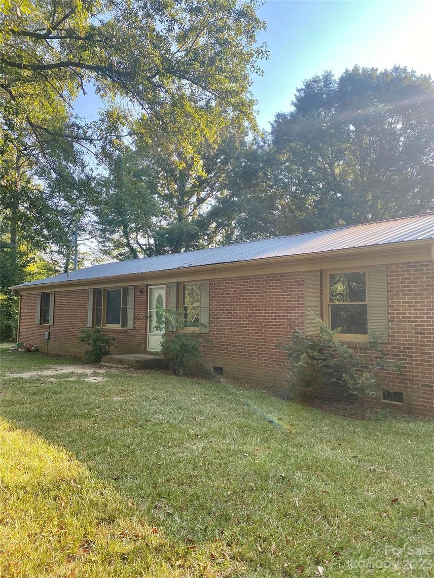 Hard to find very private lot with no neighbor 3bd brick ranch with bonus room on one acre lot in the heart of Indian land, few mins to shopping and restaurants, area are fast booming, house price will continue fast climbing ,best of all no HOA ,fence in back yard for pets, plenty parking ,large deck in back, freshly paint in and out ,also have a separate building can use as work shop or in-law suite,  SS side by side and SS stove, can use as rental property or live in, if u have horse u can build a horse barn and they are  wooded area in the back of the house can ride, house can use some upgrade with new owner’s touch , it is move in ready, sold as it, seller is retired and very motivated, bring an offer.