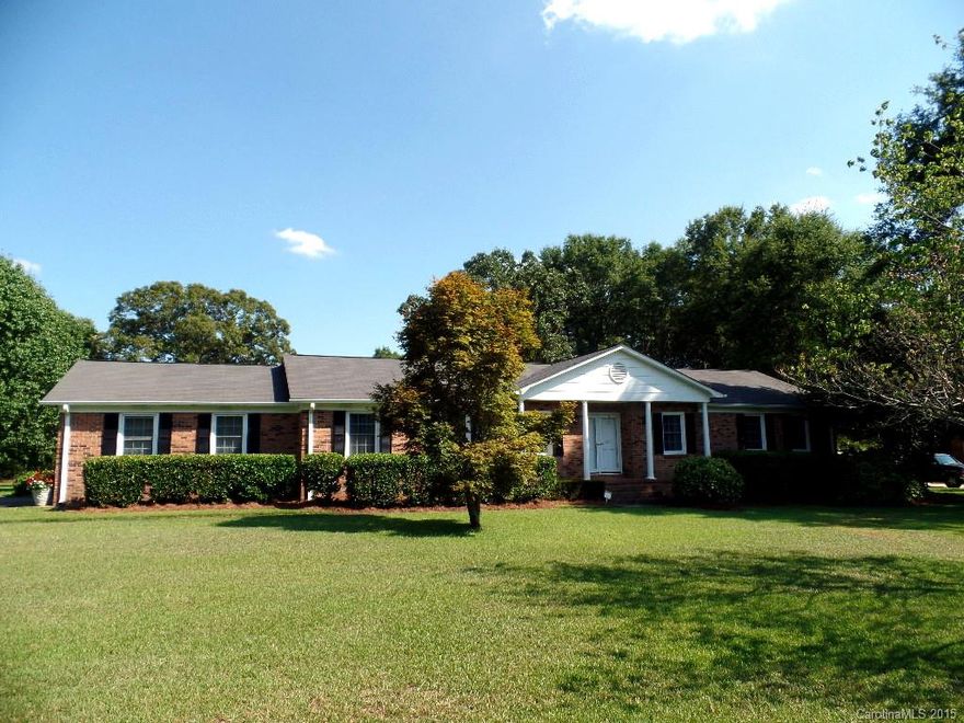 Charming, large, well-maintained one-owner 3BR/2BA brick ranch  waiting on your personal touch sitting on beautiful, landscaped acre lot near I-77 & RH Mall for commuting and shopping.  Lots of room inside & out for entertaining family & friends in the spacious den with its gas log fireplace, LR, DR, Kitchen & Breakfast Area & in the big 16 x 19 Screened Porch. Nice 21 x 24 two-car attached Carport for bad weather & convenience. Lots of storage inside.  Put this rare find on your list to show.