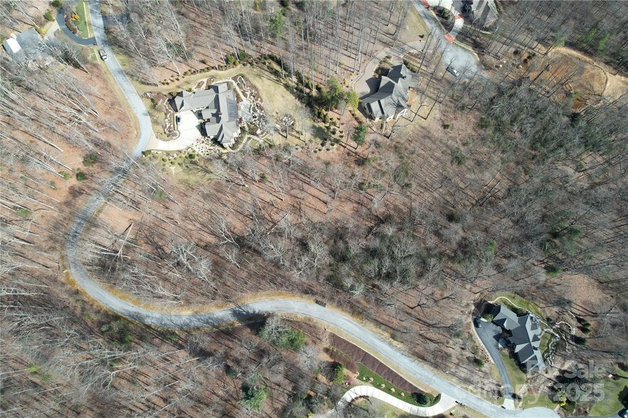 Here is your chance to own a serene cul-de-sac lot in the prestigious Kenmure community of Flat Rock, NC. This property offers access to the Kenmure Property Owners Association, providing a vibrant lifestyle with activities like hiking, book clubs, and more. As a resident, you have the option to join the Kenmure Country Club, featuring a Joe Lee-designed 18-hole golf course, tennis and pickleball courts, indoor and outdoor pools, and a modern fitness center. The clubhouse, set in a restored antebellum mansion, offers fine dining and hosts diverse events. Located just minutes from historic downtown Hendersonville and a short drive to Asheville, this lot combines tranquility with convenience. Embrace the natural beauty of the Blue Ridge Mountains and the rich heritage of Flat Rock while enjoying easy access to shops, restaurants, and cultural attractions. Don’t miss this chance to create a custom home in one of Western North Carolina’s premier gated communities.