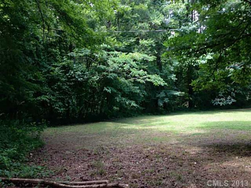Beautiful 5 acre wooded lot priced less than half of tax value.  Close proximity to Latta Park, Hornet's Nest Park, Rocking K Ranch, and much more.  Build your dream home in country tranquility or invest in this area and develop!