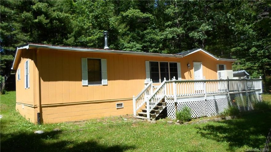 Sitting on top of the mountain in Beautiful Cedar Mountain.  This doublewide offers privacy and over 2 acres of land. Being so "AS IS'.