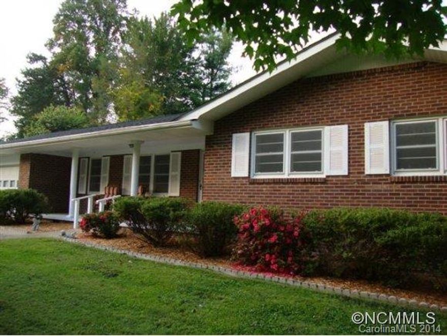 Lovely 3BR/2BA Brick Home, situated on level, partially fenced lot! Relax on this Rocking Chair Front Porch! Features Spacious Living Room /Dining Room off kitchen, lovely kitchen w/Breakfast Bar& brand new built in Microwave. Den located off kitchen w/Brick, gas log FP! Roof approx. 4-5 years old. Well maintained home, move in condition! Only minutes to Historic, Downtown Hvle, Airport & I26!  MUST SEE! No Septic Record per HCHD.