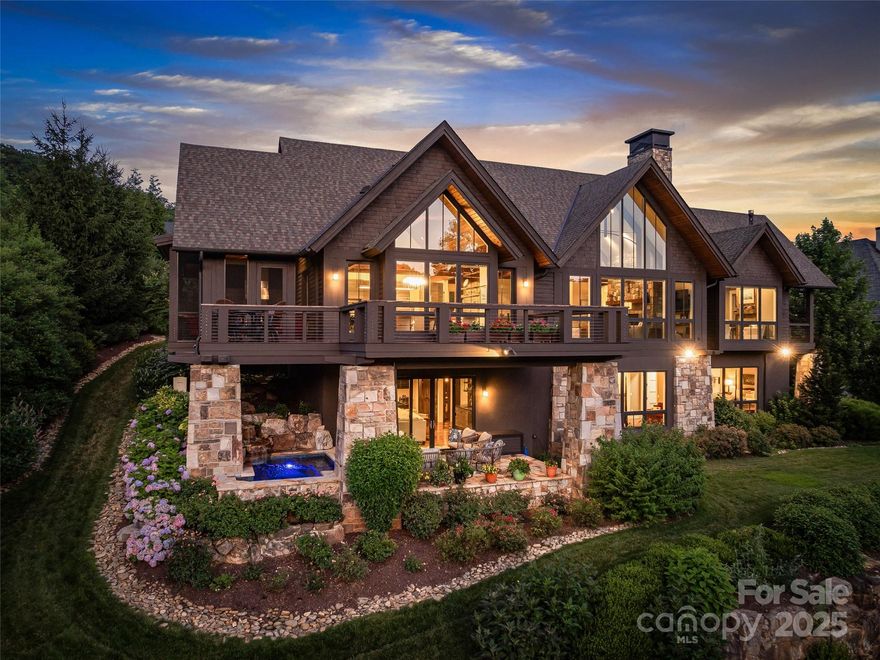 Prepare to be captivated. Punctuated with thoughtful touches, this home embraces you like a best friend. Designed by The Architectural Practice and built by Glennwood Custom Builders, every space is designed and delivered with exceptional quality to intentionally capture your day’s most memorable moments. From your bedroom, awake to your private view of Pisgah National Forest. The naturally bright and cheery living room invites you to enjoy your morning coffee overlooking Walnut Cove’s 11th golf hole. Enjoy your meals while taking in panoramic views from the dining room. Become mesmerized by the sunset over the mountains on the open deck, or exchange stories over evening cocktails on the screened porch. The oversized spa, complete with a waterfall, invites you to unwind as fireflies dance over the valley. Even though your sanctuary feels a world away, you are a short stroll to Walnut Cove’s Club Village for top shelf dining, golf and merrymaking. Your newest memories start right here.