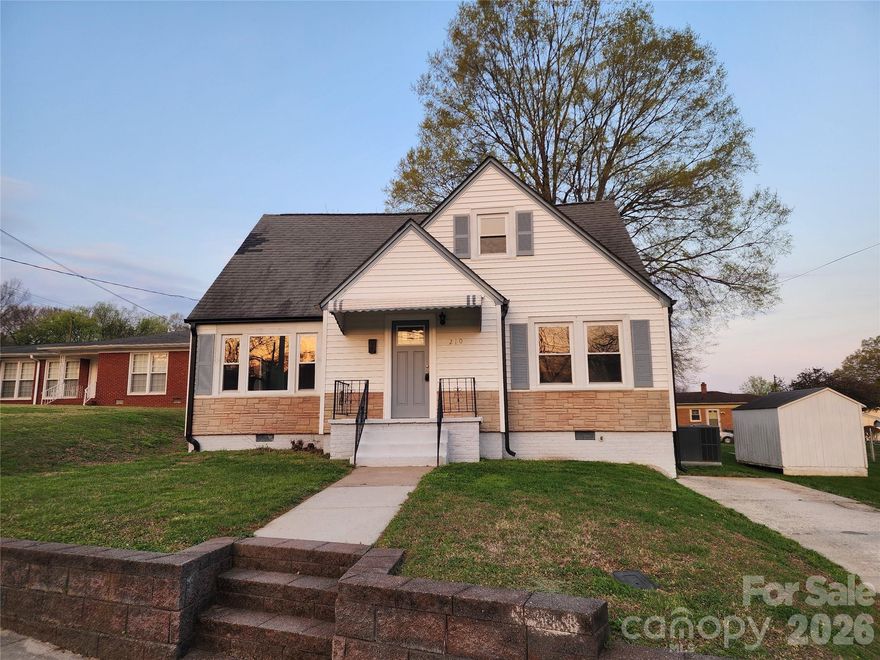 Remodeled 4 bedroom home located close to downtown Concord. Traditional floorplan with 2 bedrooms downstairs with main bathroom and 2 additional rooms upstairs.  Beautiful refinished hardwood flooring and interior paint throughout. The kitchen features white cabinets and black stainless gas range and dishwasher.  The laundry room features a half bathroom with enough room to add a corner shower later.  New PEX water and sewer lines with energy saving gas tankless water heater.   New indoor panel with breakers and exterior service was completed.  New electric HVAC for the downstairs and new ductwork as well.  New vapor barrier in the crawlspace.  This home is ready for the new owner.