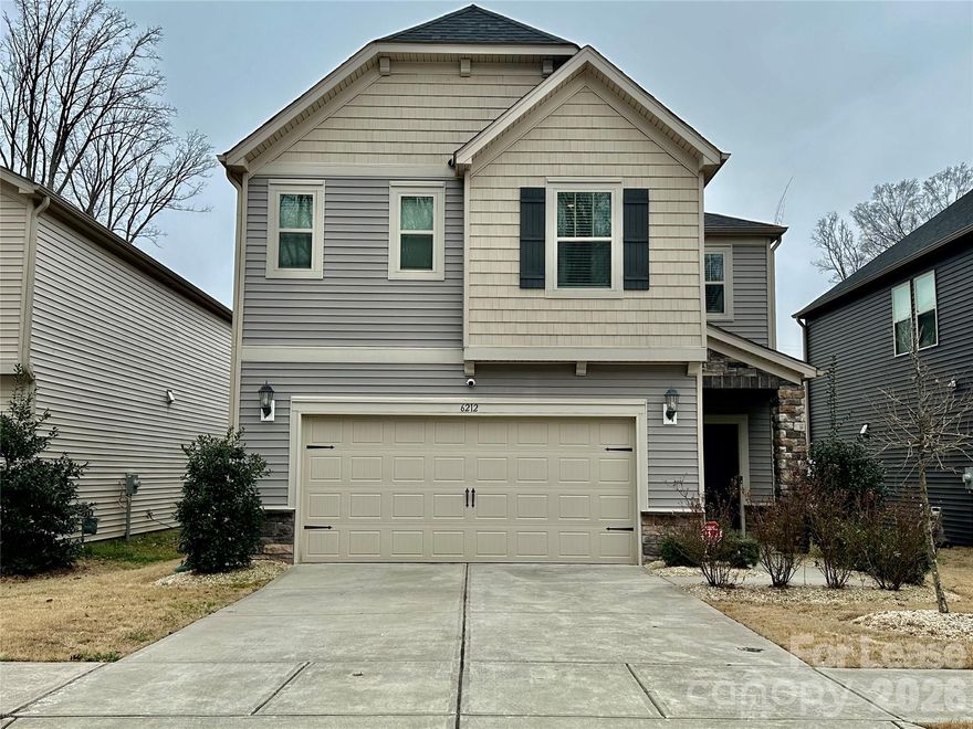 Two-story unfurnished single-family home built in 2020 offering 4 bedrooms, 2.5 bathrooms, and 2,151 square feet of heated living space on a 0.10-acre lot in Charlotte 28215. The main level features an open-concept layout with a spacious living area flowing into the dining space and kitchen, complete with an island, walk-in pantry, and ample cabinet storage, along with a convenient half bath and direct access to the attached two-car garage. Upstairs includes all four bedrooms, highlighted by a primary suite with a walk-in closet and private bath, plus an additional full bath and upper-level laundry for practical daily function. Located in northeast Charlotte, the property offers convenient access to Albemarle Road and I-485, providing an easy commute to Uptown Charlotte, University area employers, shopping, dining, and everyday retail amenities while remaining tucked within a residential neighborhood setting.