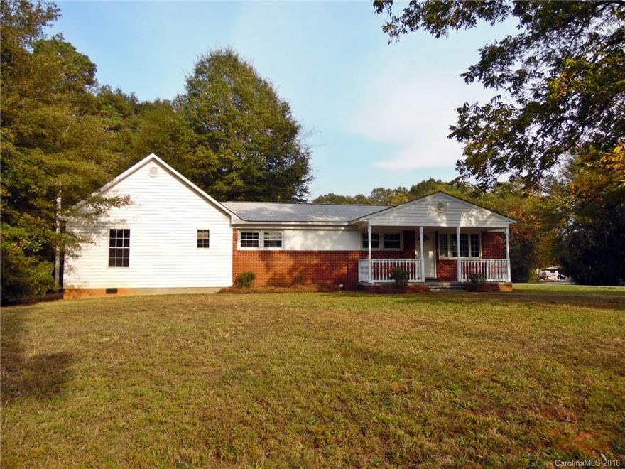 Currently zoned for low county taxes, this 3 bedroom, 2.5 bath ranch is located on just over 1 acre of land with easy access to nearby conveniences! Surrounded by shade trees, this home features a large master with private bath, spacious secondary bedrooms, front porch perfect for rocking chairs & attached storage. Just waiting on your personal touches! Strongly encouraged that offers include proof of funds/pre-approval & is required for seller's final acceptance.