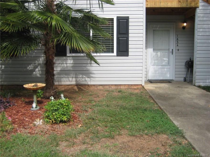 Ready to move in Condo, Family room w/ laminate flooring, Kitchen w/ stove, DW, built in microwave, refrigerator (2013) & pantry, Breakfast area, Hallway w/ laminate flooring, Washer (2103), Dryer (2013), windows (2017), Fenced & covered side porch w/ attached storage, Close to I-77
