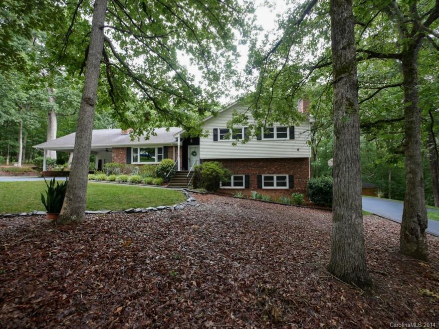 Perfectly maintained custom built home one owner home. Superb condition inside & out. Large great room w/full fireplace. Downstairs is a heated & air conditioned shope with 1 car garage door and room for 2 cars and all equipment you would need. Very private & secluded location 3 minutes from I-485. Low county taxes. Beautiful large lot.