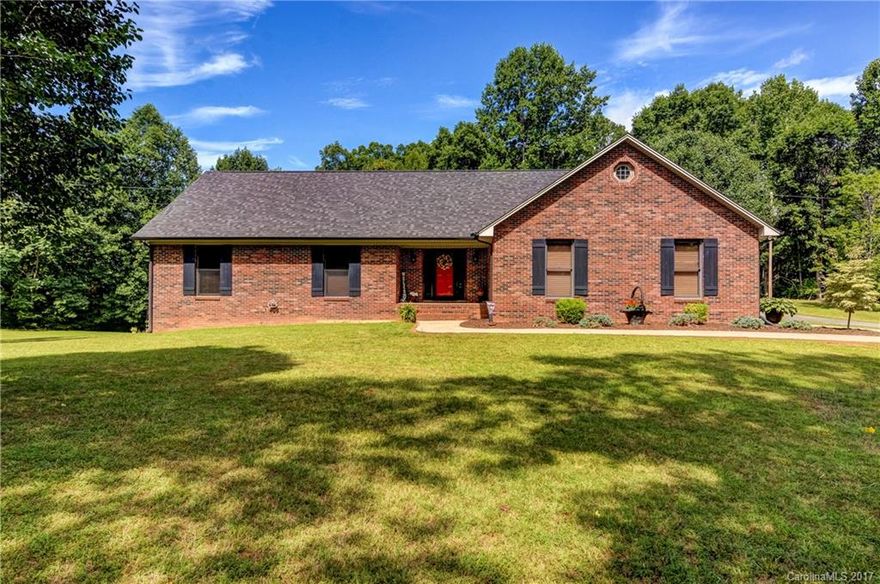 Gorgeous ranch with a basement on a picture perfect 2.82 acres! Quiet, open concept and updated home, 3 bedrooms on main, enormous finished basement with new carpet and a walk out to the patio. Enjoy views of your rolling lot from your back deck or tall windows. Walk up attic potential additional bedroom or separate living area. already roughed in and ready to be whatever you imagine! Detached garage is a great workshop with electricity and water. Convenient to 321, and an easy drive to I-85.