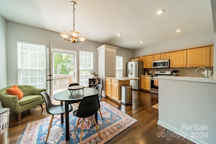 Nestled in the highly sought-after South Charlotte neighborhood, this stunning townhome offers the perfect blend of modern comfort and convenience. Located just minutes from the vibrant SouthPark area, you'll enjoy easy access to top-tier shopping, dining, and scenic greenways. Step inside and be greeted by an inviting, spacious floor plan with beautiful hardwood floors on the main level, complemented by newly added LVP flooring on the main and third floors. The main floor features a versatile flex room, ideal for a home office or exercise room, while the cozy gas fireplace adds warmth and charm to the living area. The gourmet kitchen is a chef’s dream, boasting a gas range for culinary creations. Relax or entertain on the deck, and appreciate the updates including a new furnace installed in 2022 and HVAC system in 2018/2019.