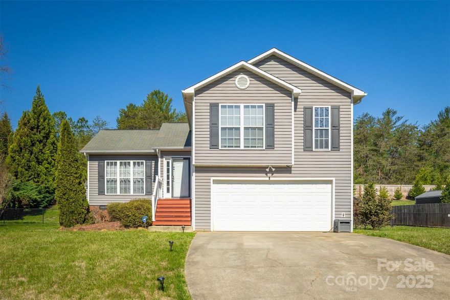 106 S River Glen Dr - $365,000 This inviting 3-bed, 2.5-bath tri-level home is located in the desirable River Glen Subdivision, minutes from Lake James, shopping, dining, and schools. Upon entering, you're greeted by a vaulted ceiling, natural light, and a cozy gas fireplace. The kitchen features maple cabinetry, stainless steel appliances, and a spacious layout. Step outside to a large deck and generous, landscaped backyard with a large fenced-in yard, ideal for entertaining, children, or pets. The upper level has new flooring and fresh paint. The spacious primary suite offers a walk-in closet and en-suite bathroom with double vanity and shower/tub combo. A second full bath serves the two additional bedrooms. Bedroom level laundry closet for added convenience. The lower level features a versatile Family/Flex Room with an oversized half bath. The home also includes a natural gas furnace, central air conditioning, attached two-car garage, and a large driveway for ample parking.