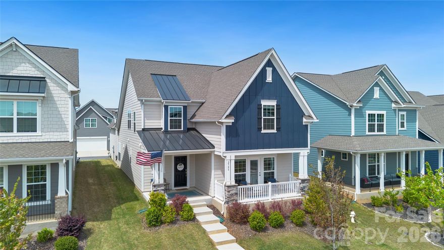 This home is sitting on the cutest street in the community! It's named Monument Point for a reason! The homes sit higher on the lots and give that "Wisteria Lane" vibe with cute cottage looking homes, front porches for sitting and extra wide street for guest parking. This home offers Primary Suite on main level with walk-out private owners porch - great for morning coffee or evening cocktails. It also offers a separate front porch great for entertaining. Only 2 years old this home has been well taken care of with many upgrades. Large laundry room with extra storage space, open kitchen to family room. Kitchen with upgraded appliances, double ovens, gas stove, quartz countertops and upgraded cabinets. Front staircase to 2 spacious bedrooms and loft for playroom or office. Backstair case to private bedroom/bonus with full bath. Perfect Junior Suite or back office. Cozy screen porch and side yard for activities. 2 car garage with back entry. State of the art - community center with fitness center, sport courts, pickleball courts, pool, club house and more...