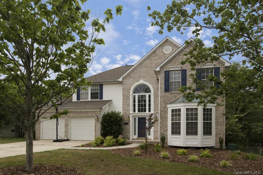 FINISHED BASEMENT HOME nestled in a predominantly brick home community comes with a lot of upgrades. Home features stainless steel appliances, granite counter-tops, stone backsplash, refaced cabinets, recessed lighting in kitchen and family room, bamboo (stranded) hardwood flooring in foyer, living room, dining room, kitchen and family room, warm neutral colors throughout home, walk-out basement and a fenced yard. Great transitional home that is a must see! HOME WARRANTY PROVIDED!